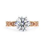 Elegant Central Stone Diamond Ring with Radiant Side Accents