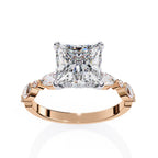 Elegant Central Stone Diamond Ring with Radiant Side Accents