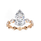 Radiant Central Stone Diamond Ring with Shimmering Side Accents