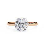 Elegant Central Stone Diamond Ring with Radiant Side Accents