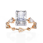 Radiant Central Stone Diamond Ring with Shimmering Side Accents