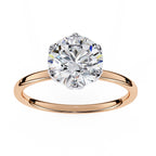 Elegant Central Stone Diamond Ring with Side Accents