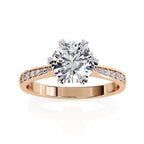 Elegant Central Stone Diamond Ring with Radiant Side Accents
