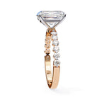 Radiant Central Stone Diamond Ring with Shimmering Accents