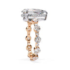 Radiant Central Stone Diamond Ring with Shimmering Side Accents