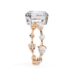 Radiant Central Stone Diamond Ring with Shimmering Side Accents