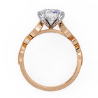 Elegant Central Stone Diamond Ring with Radiant Side Accents