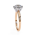 Elegant Central Stone Diamond Ring with Side Accents