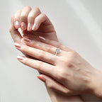 Elegant Central Stone Diamond Ring with Radiant Side Accents
