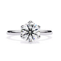 Elegant Central Stone Diamond Ring with Side Accents