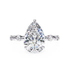Elegant Central Stone Diamond Ring with Radiant Side Accents
