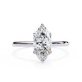 Elegant Diamond Central Stone Side Accent Ring