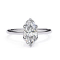 Elegant Central Stone Diamond Ring with Side Accents