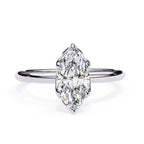 Elegant Central Stone Diamond Ring with Side Accents