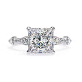 Elegant Central Stone Diamond Ring with Radiant Side Accents