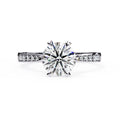 Elegant Central Stone Diamond Ring with Radiant Side Accents