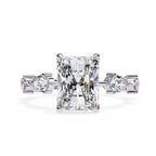 Radiant Central Stone Diamond Ring with Shimmering Side Accents