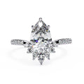 Elegant Central Stone Diamond Ring with Side Accents