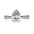 Radiant Central Stone Diamond Ring with Shimmering Side Accents