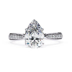 Radiant Central Stone Diamond Ring with Shimmering Side Accents
