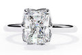 Elegant Central Stone Diamond Ring with Radiant Side Accents