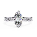 Elegant Central Stone Diamond Ring with Side Accents