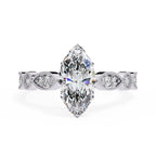 Elegant Central Stone Diamond Ring with Side Accents