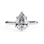 Elegant Central Stone Ring with Shimmering Side Diamonds
