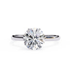 Elegant Central Stone Diamond Ring with Radiant Side Accents