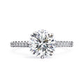 Elegant Central Stone Diamond Ring with Side Stone Accents