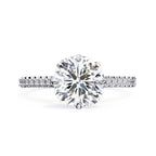 Elegant Central Stone Diamond Ring with Side Stone Accents