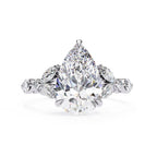 Radiant Central Stone Diamond Ring with Shimmering Side Accents