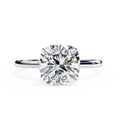 Radiant Central Stone Diamond Ring with Shimmering Side Accents