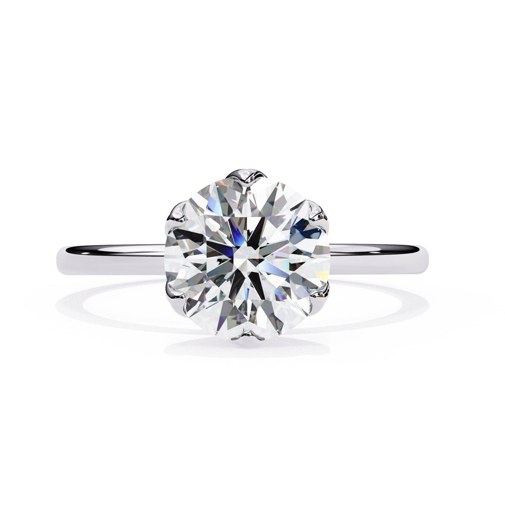 Elegant Central Stone Diamond Ring with Side Accents