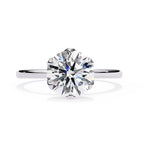 Elegant Central Stone Diamond Ring with Side Accents