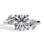 Exquisite Central Stone Diamond Ring with Shimmering Side Accents