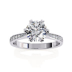 Elegant Central Stone Diamond Ring with Radiant Side Accents