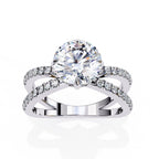 Elegant Central Stone Diamond Ring with Side Accents