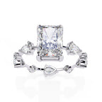 Radiant Central Stone Diamond Ring with Shimmering Side Accents