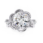 Radiant Central Stone Diamond Ring with Shimmering Side Accents