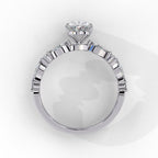 Radiant Central Stone Diamond Ring with Shimmering Side Accents