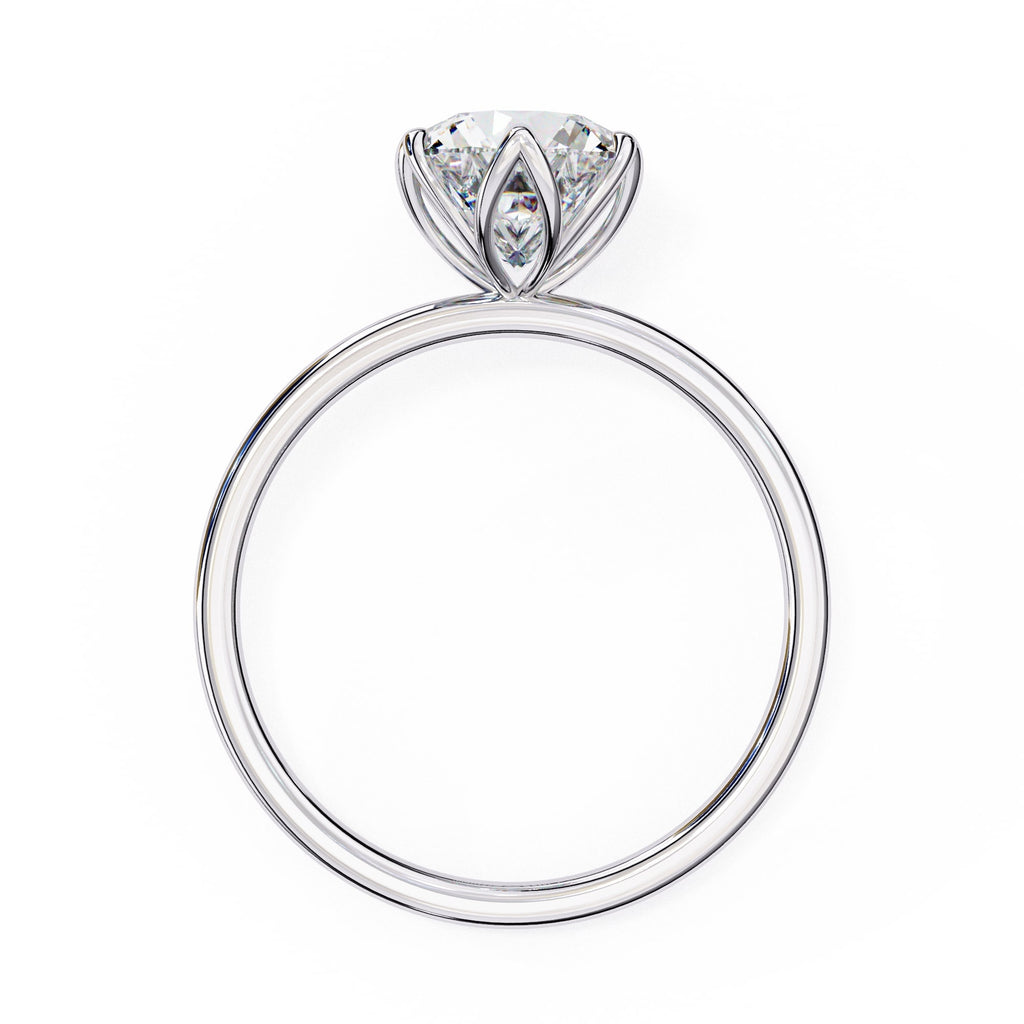 Elegant Central Stone Diamond Ring with Side Accents