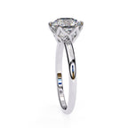 Elegant Central Stone Diamond Ring with Side Accents