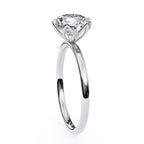 Elegant Central Stone Diamond Ring with Side Accents