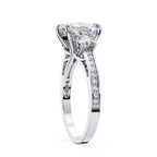 Elegant Diamond Central Stone Ring with Shimmering Side Accents