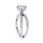 Elegant Central Stone Diamond Ring with Side Accents