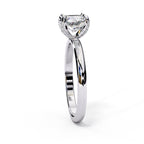 Radiant Central Stone Diamond Ring with Shimmering Side Accents