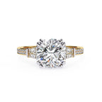 Elegant Central Stone Diamond Ring with Side Accents