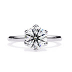 Elegant Central Stone Diamond Ring with Side Accents