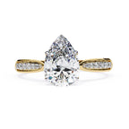 Radiant Central Stone Diamond Ring with Shimmering Side Accents